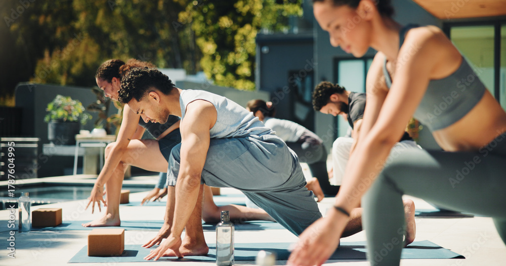 Poolside yoga class in the morning sun
